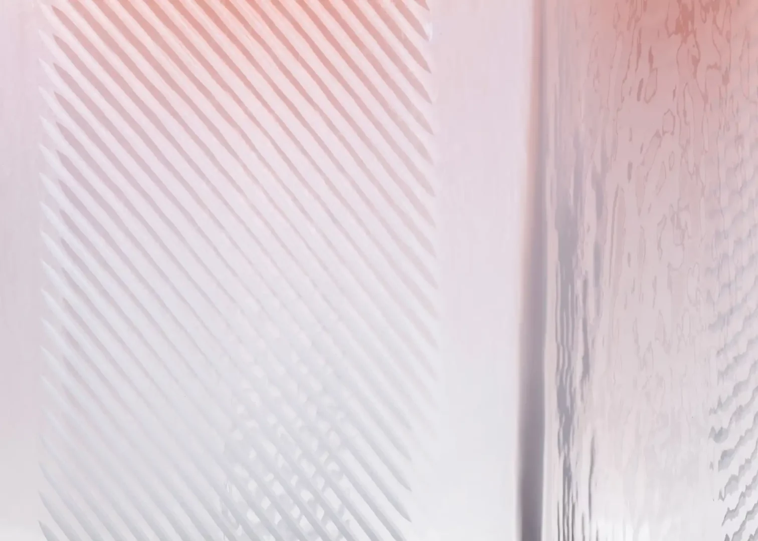 Abstract frosted glass texture with pink lighting.