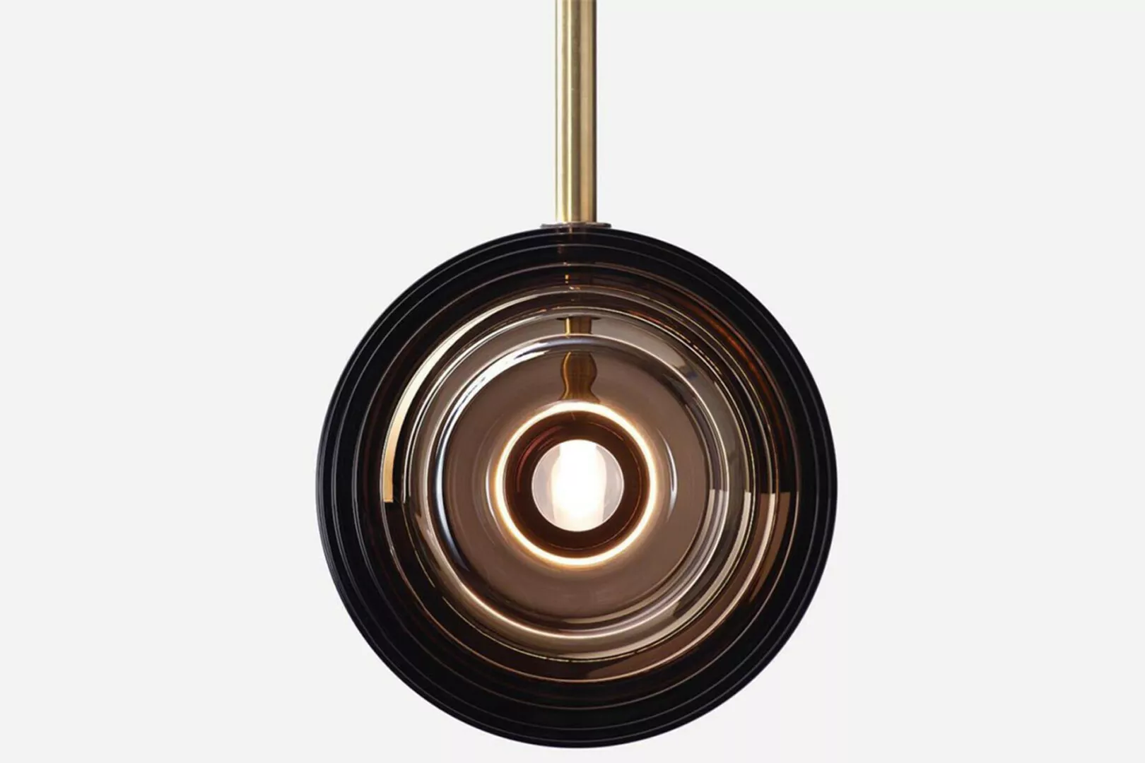 Modern circular black and gold pendant light.
