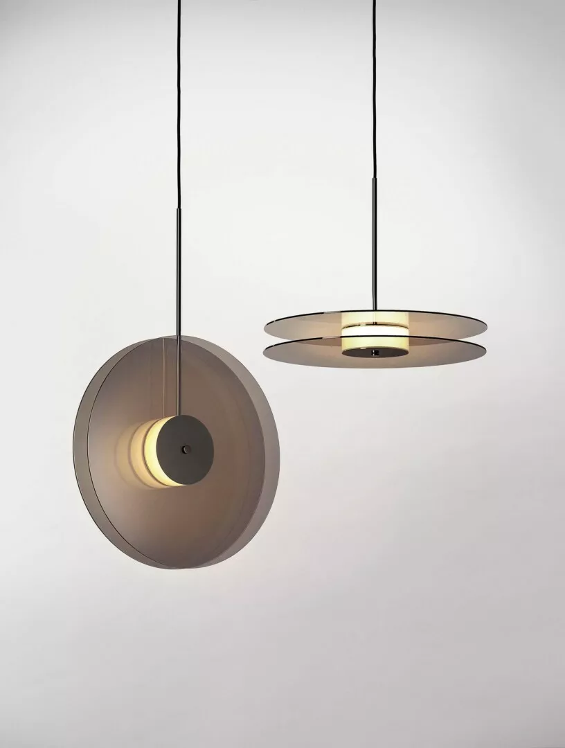Modern hanging pendant lights with metallic finish.