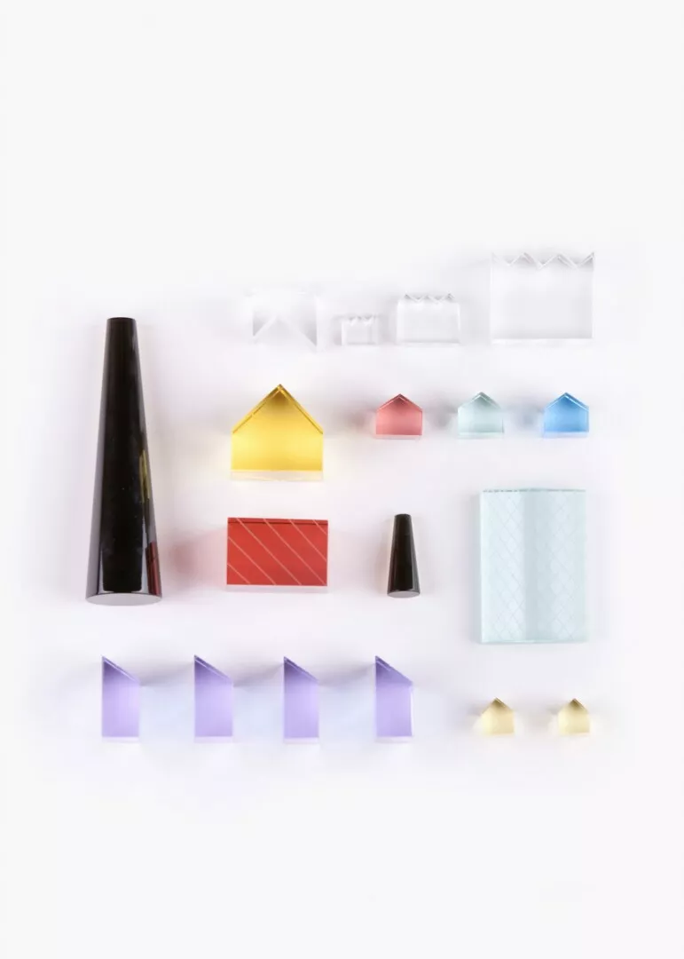 Colorful geometric shapes arranged on white background.