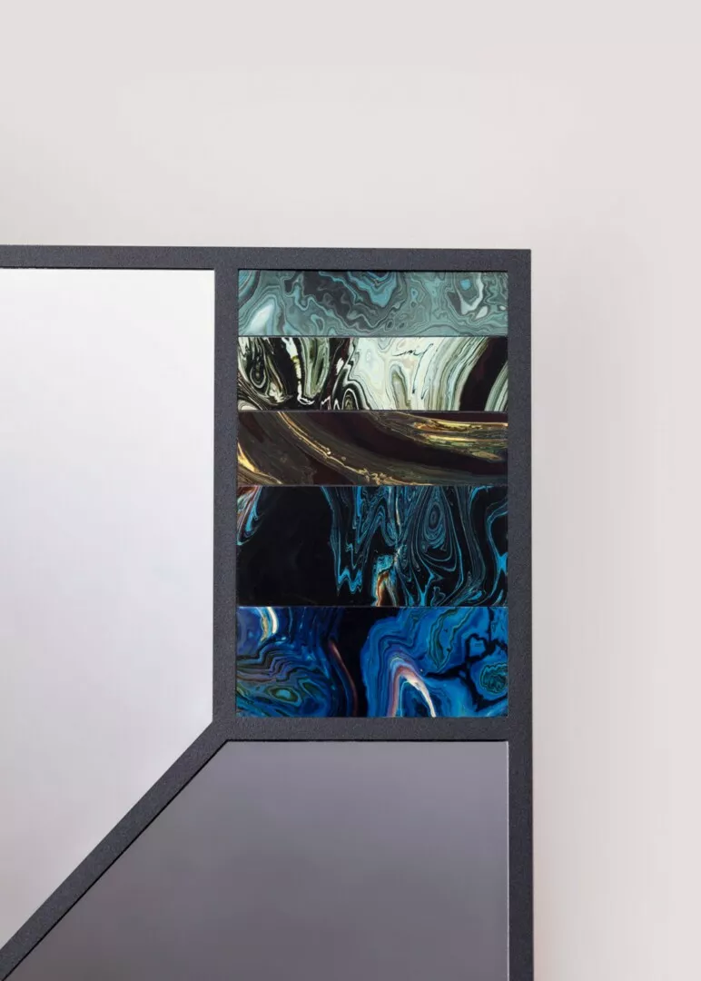 Abstract marbled art in geometric frame display.
