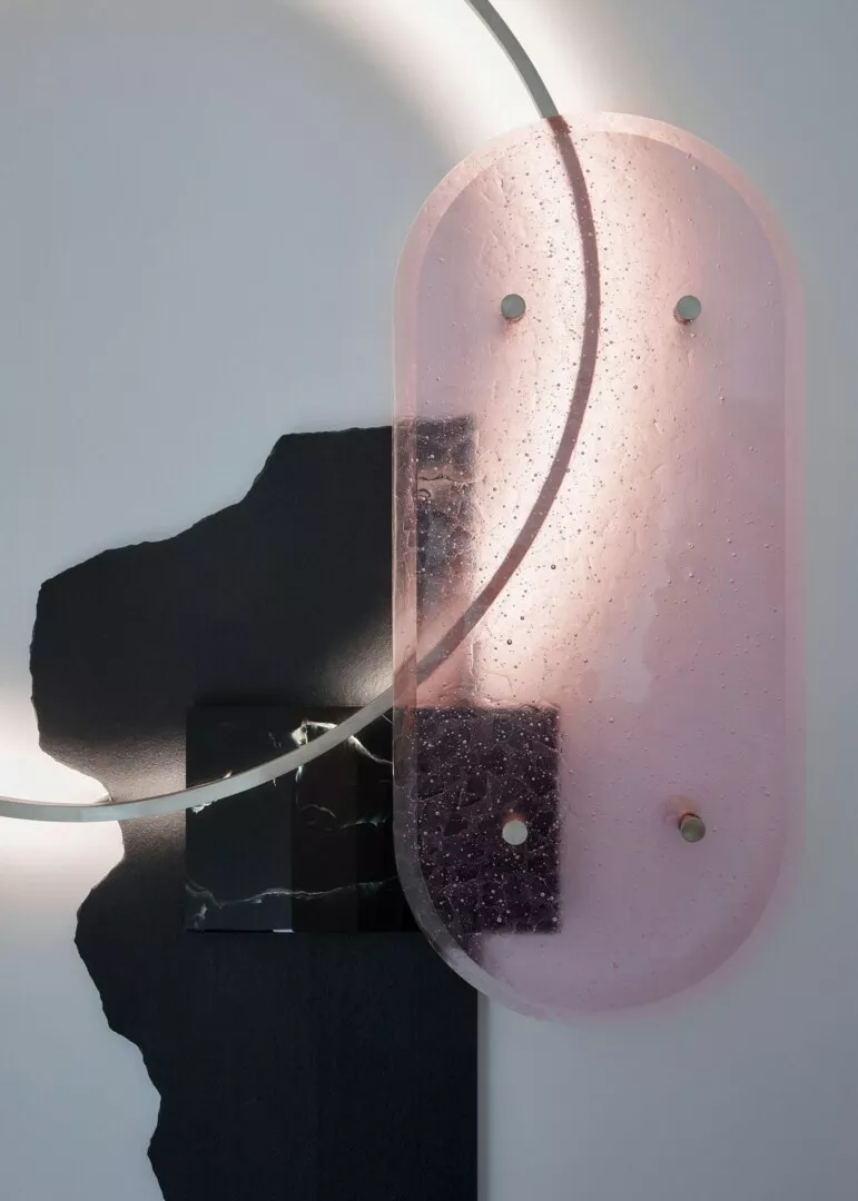 Modern pink textured glass wall light.