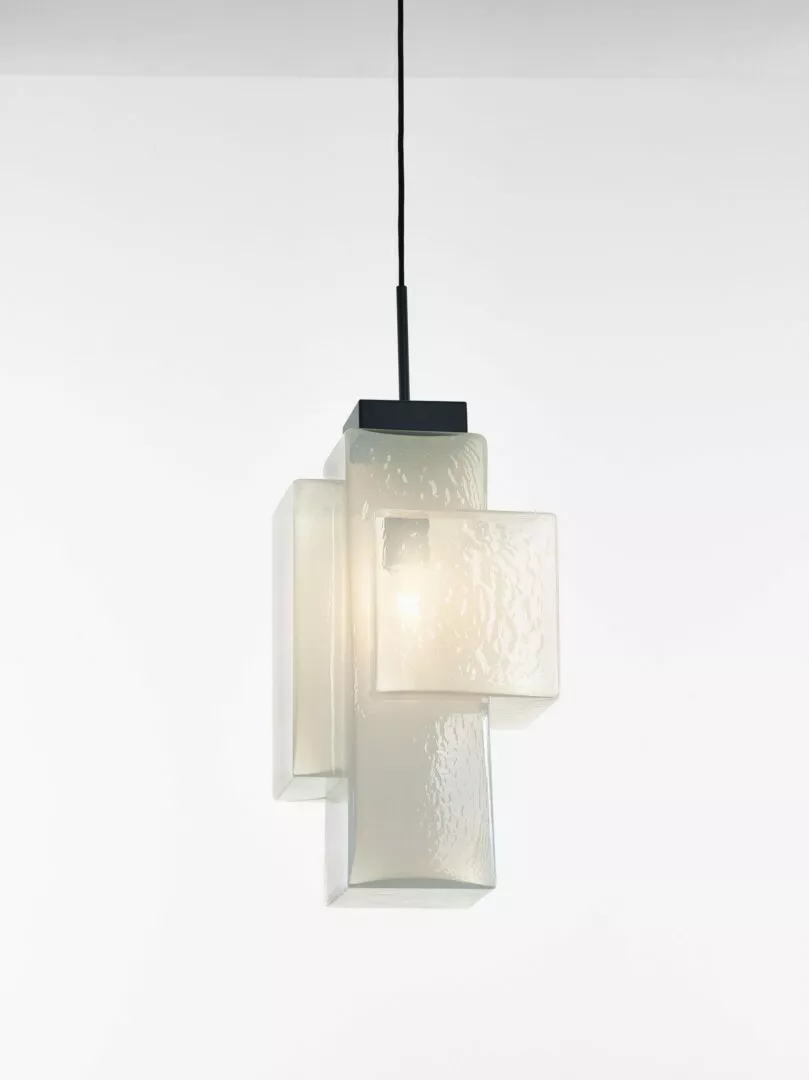 Modern frosted glass pendant light hanging, minimalist design.
