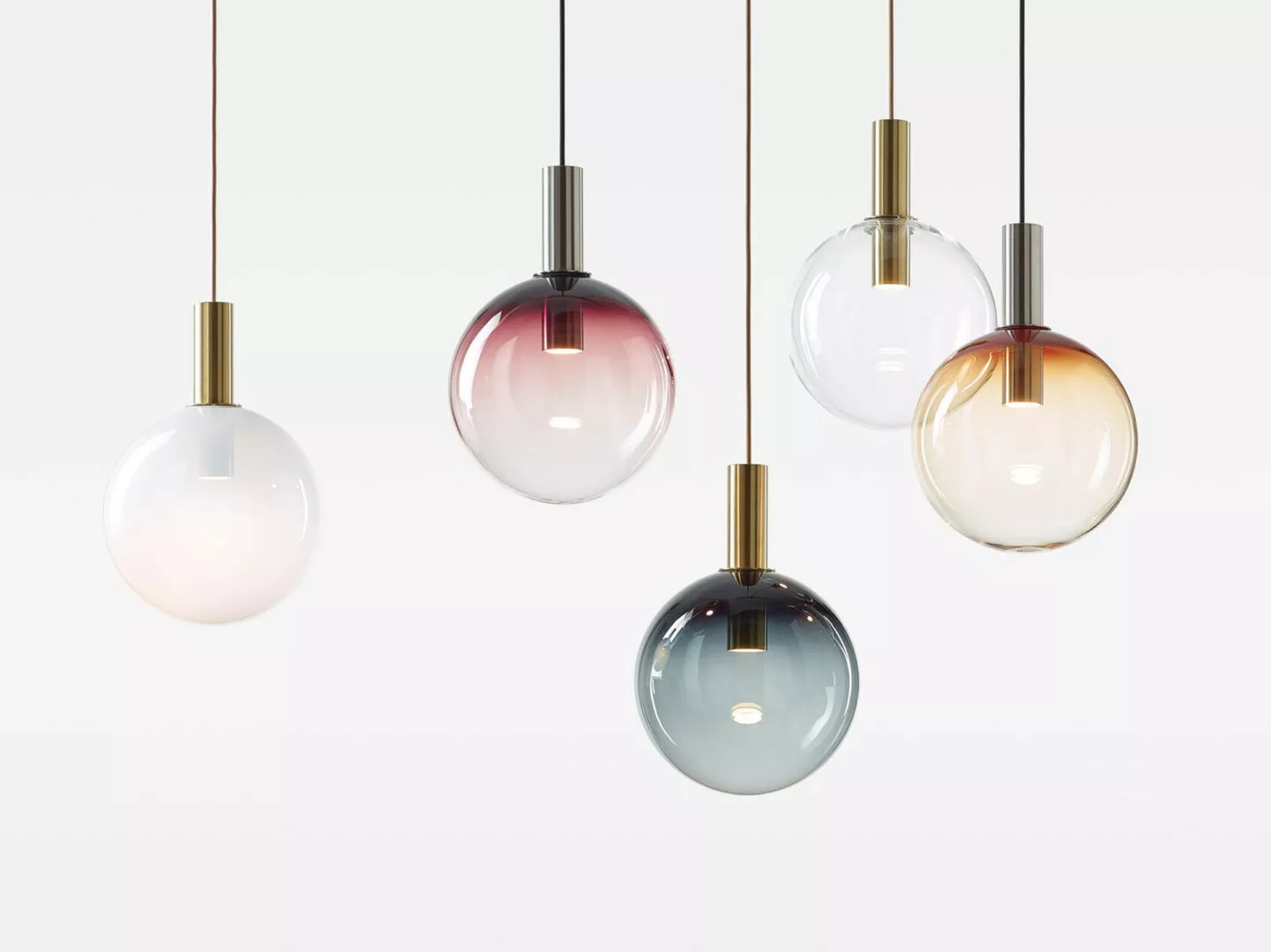 Five colorful glass pendant lights hanging on white background.